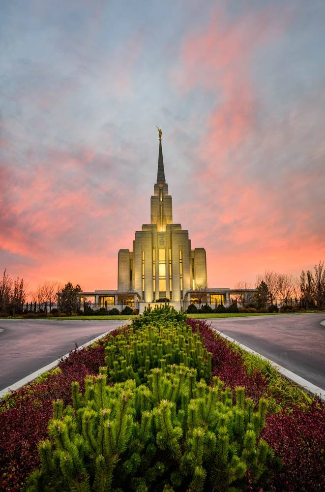LDS art vertical photo of the Oquirrh Mountain Temple and the narrow flowerbed leading to the entrance.
