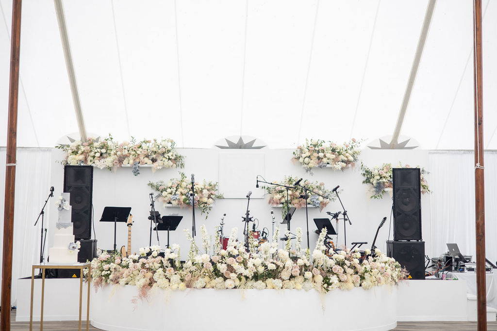 Pastel flowers covering stage
