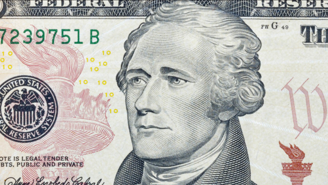 10 dollar bill featuring Alexander Hamilton.