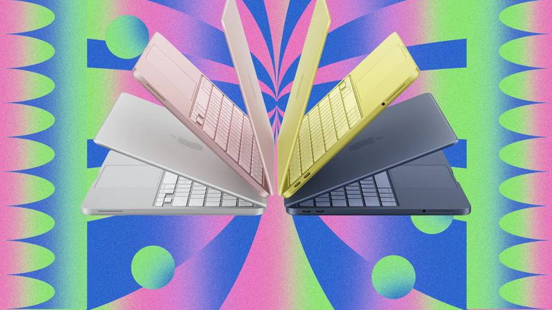4 laptops semi folded and spread out back-to-back