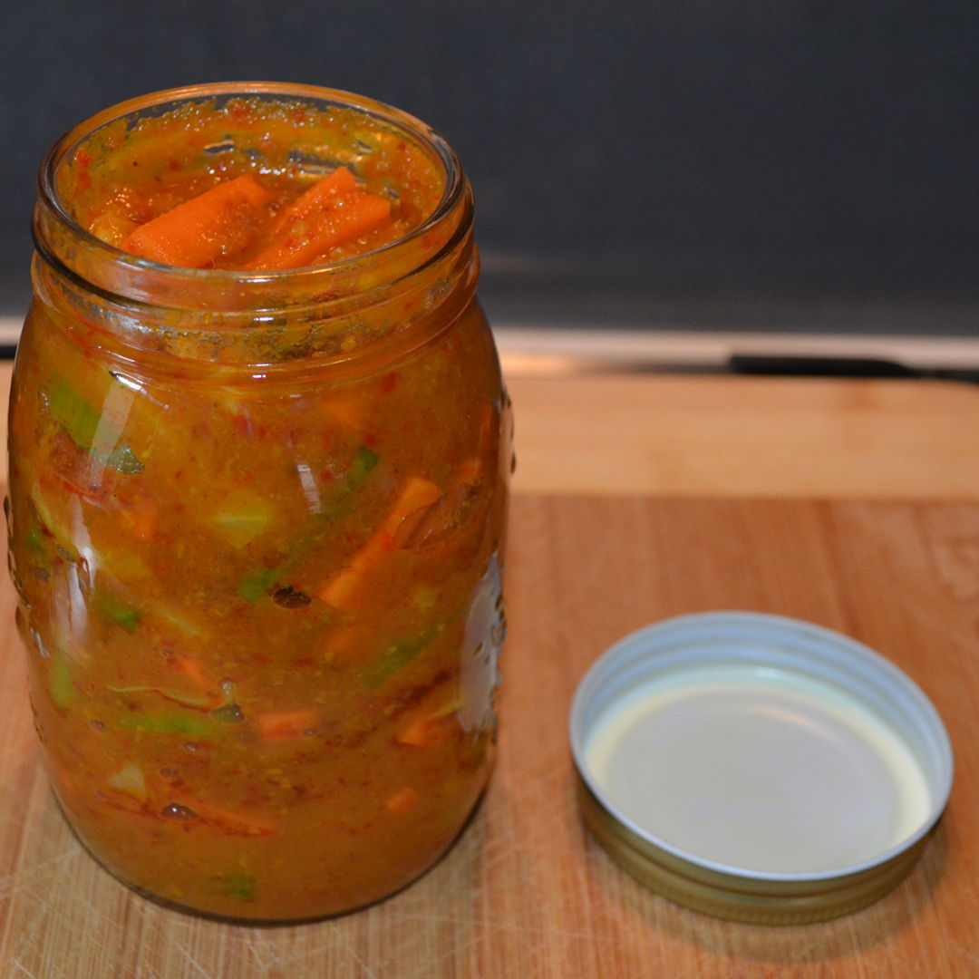 Date: 15 Feb 2020 (Sat)
29th Side: Spicy Vegetable Relish (Acar Awak) [225] [146.0%] [Score: 8.5]
Cuisine: Malaysian, Singaporean, Indonesian, Bruneian 
Dish Type: Side
Spicy Vegetable Relish is pickled vegetables which are mildly spiced, sourish and with a tinge of sweetness. It serves as a condiment as well as an accompaniment to many local dishes due to its tantalizing flavours.

Image shows Spicy Vegetable Relish being bottled ready for storage.