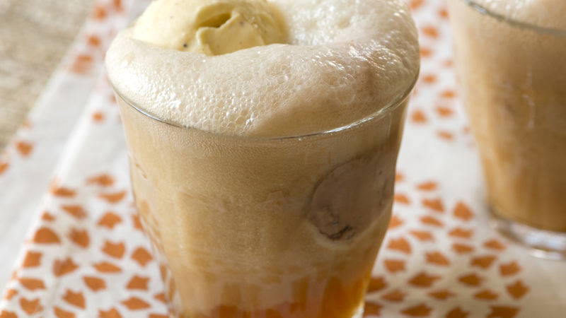clear cup with ice cream float drink