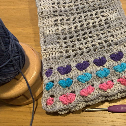 Pattern Valentine's hearts scarf with the heart stitch.