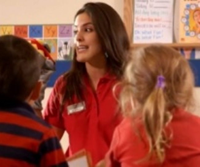 Close up of a Primrose teacher interacting with her students