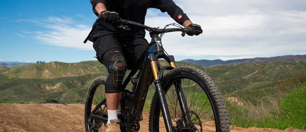 A man riding an electric mountain bike in the wilderness