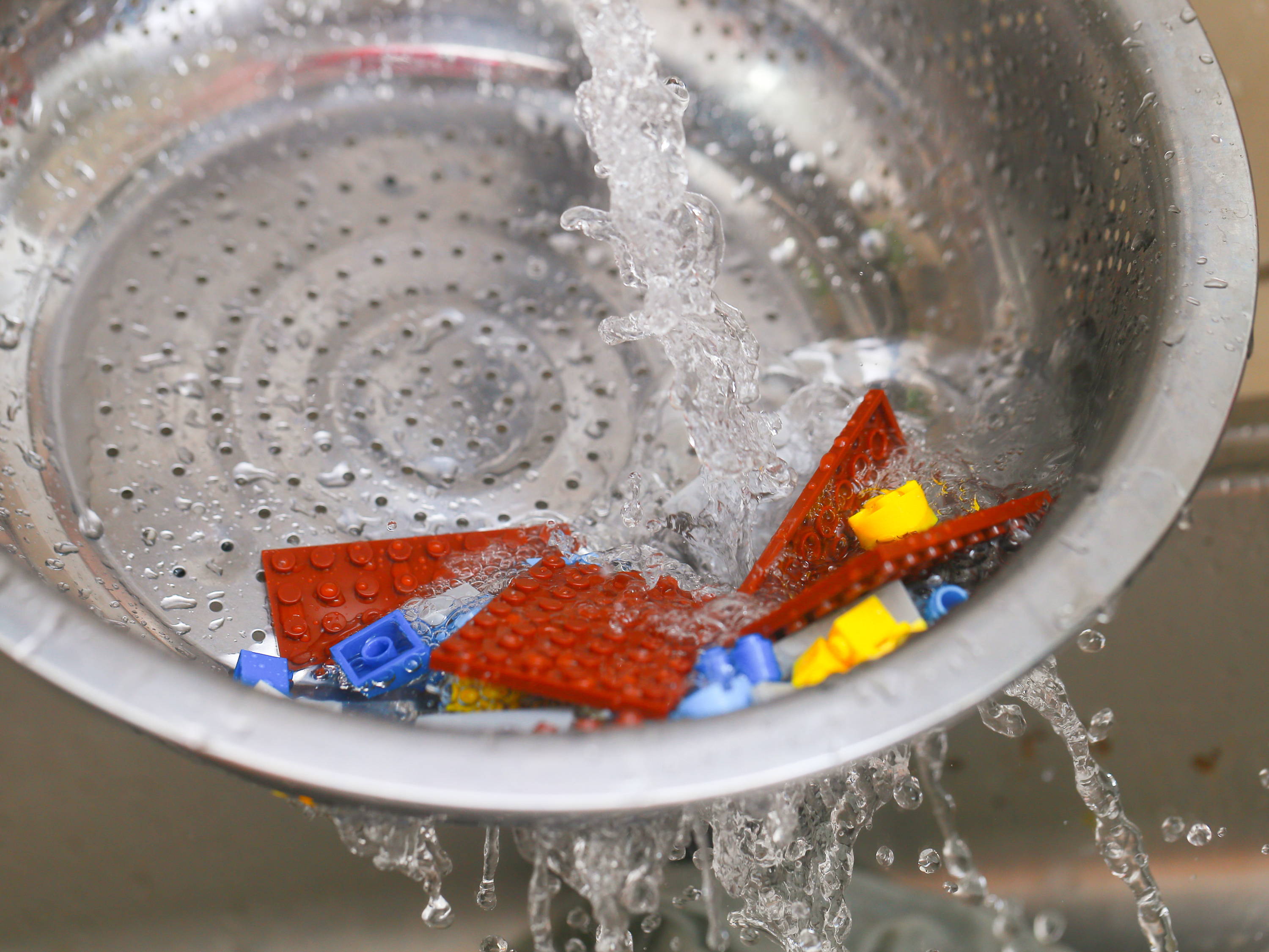 clean lego set with water