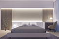 Photo of bedroom, headboard is lit by LED striplights, photo links to blog post how to connect to a dimmable driver