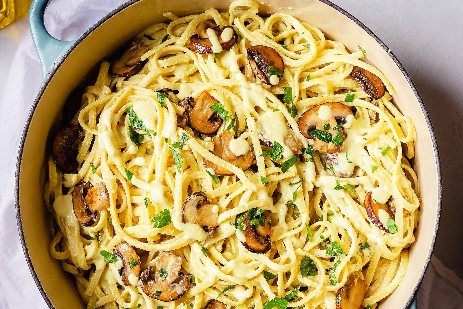 A pot full of delicious, vegetarian Mushroom Carbonara ready to serve.