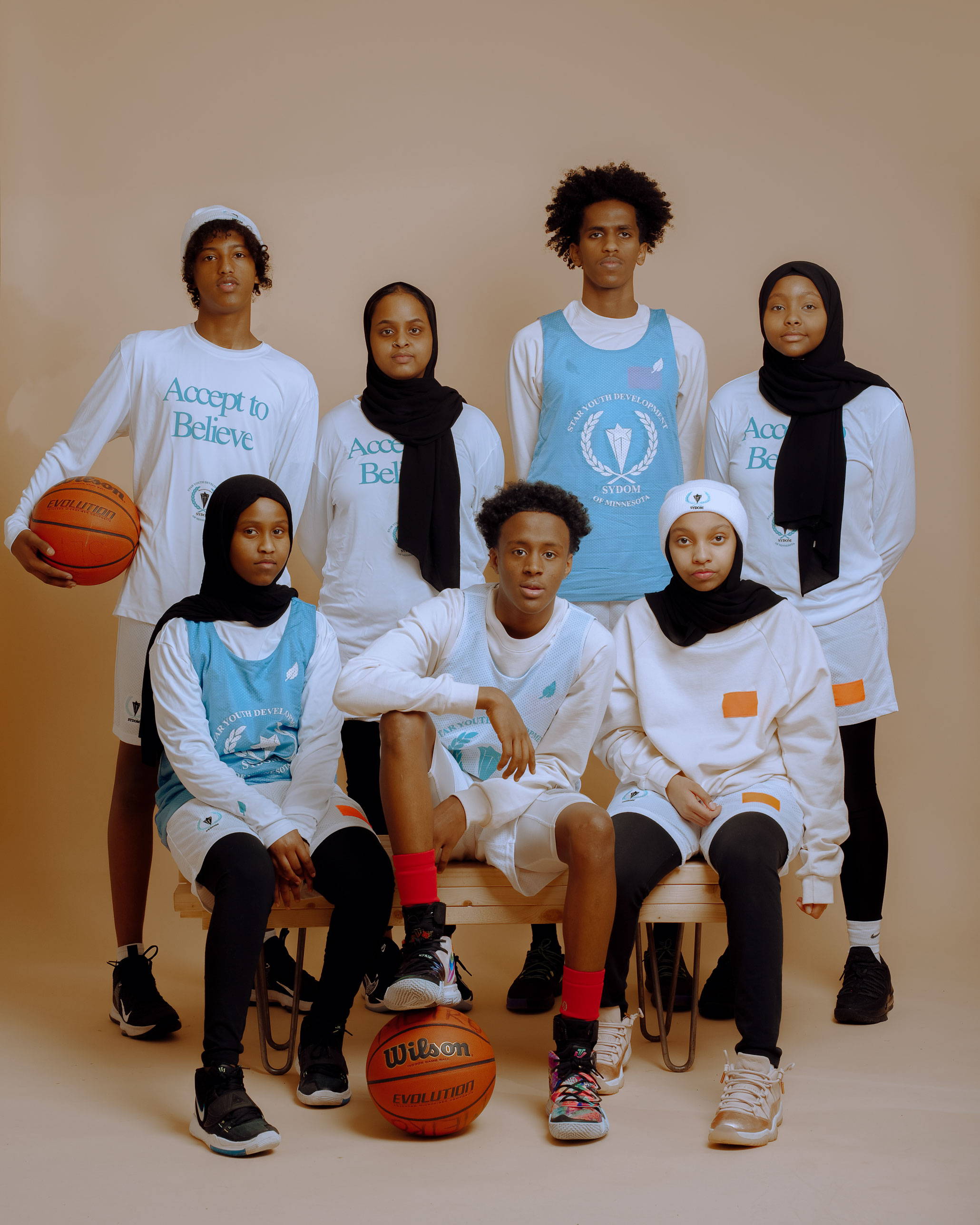 Somalia Youth Development Organizations Basketball Team and Epimonia Recycled Refugee Life Jackets Apparel and Gear Orange