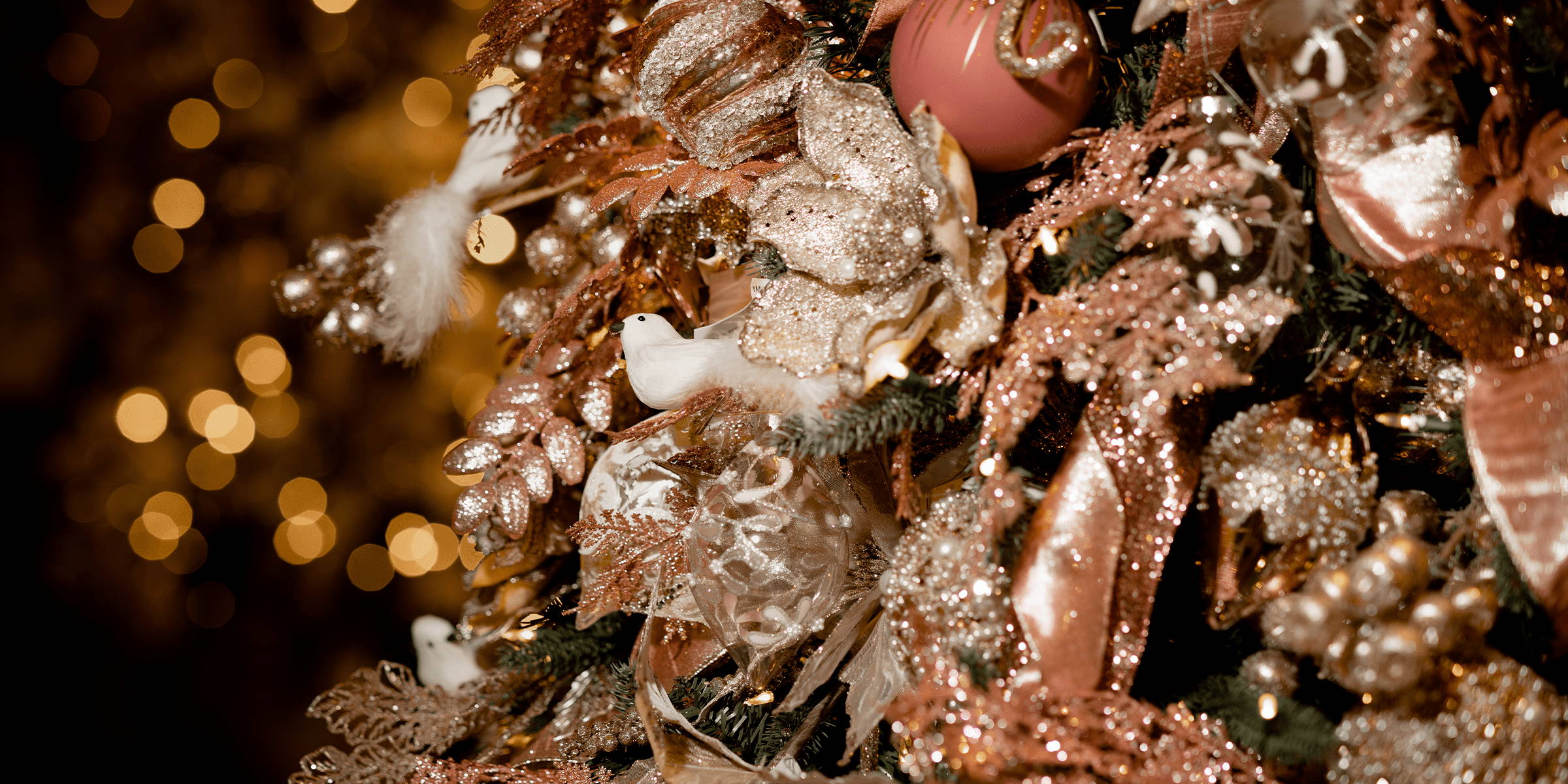 Christmas decor with shades of pink and rose gold accented by pearls