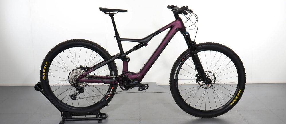 Orbea Rise e-bike on a stand