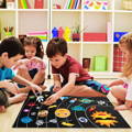 Children playing with a Montessori Learning Felt Board in Universe style in their classroom.