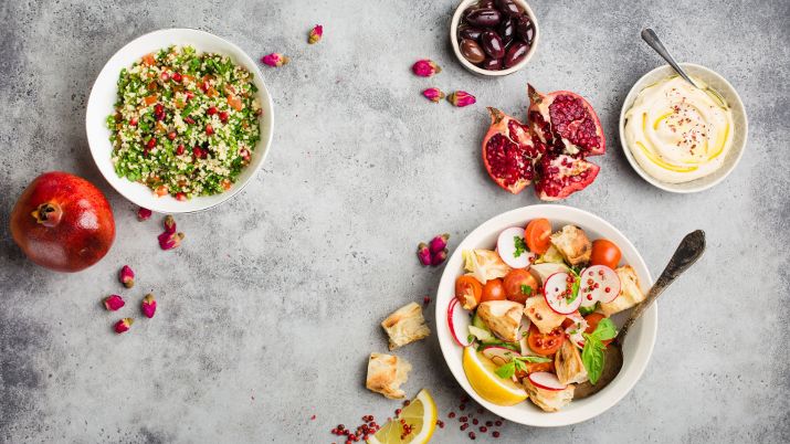 Tabbouleh, Fattoush, Oriental Ensemble, fresh salads and dishes contributing to a vibrant Middle Eastern spread