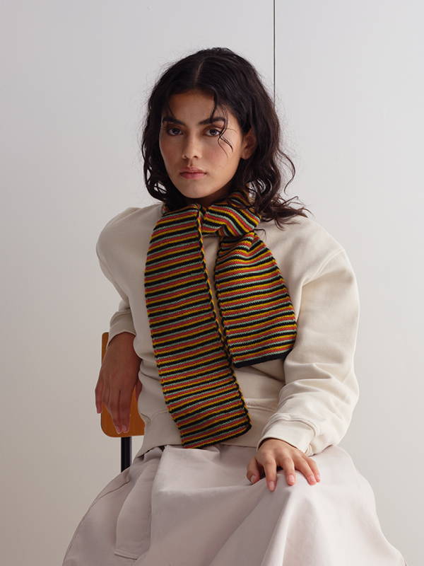 model wears Small Multicolour Garter Stitch Scarf