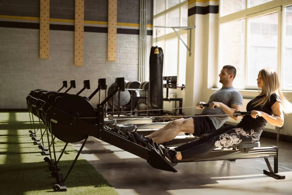 athletes rower training in gym