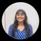 Komal C., freelance Client Reporting developer