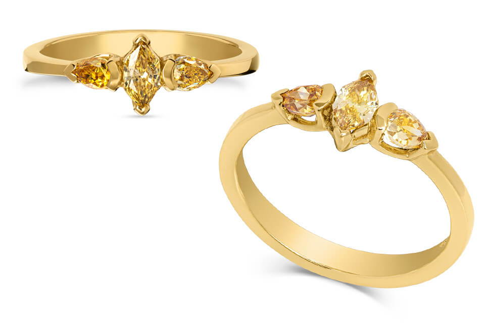 three stone rings with yellow diamonds