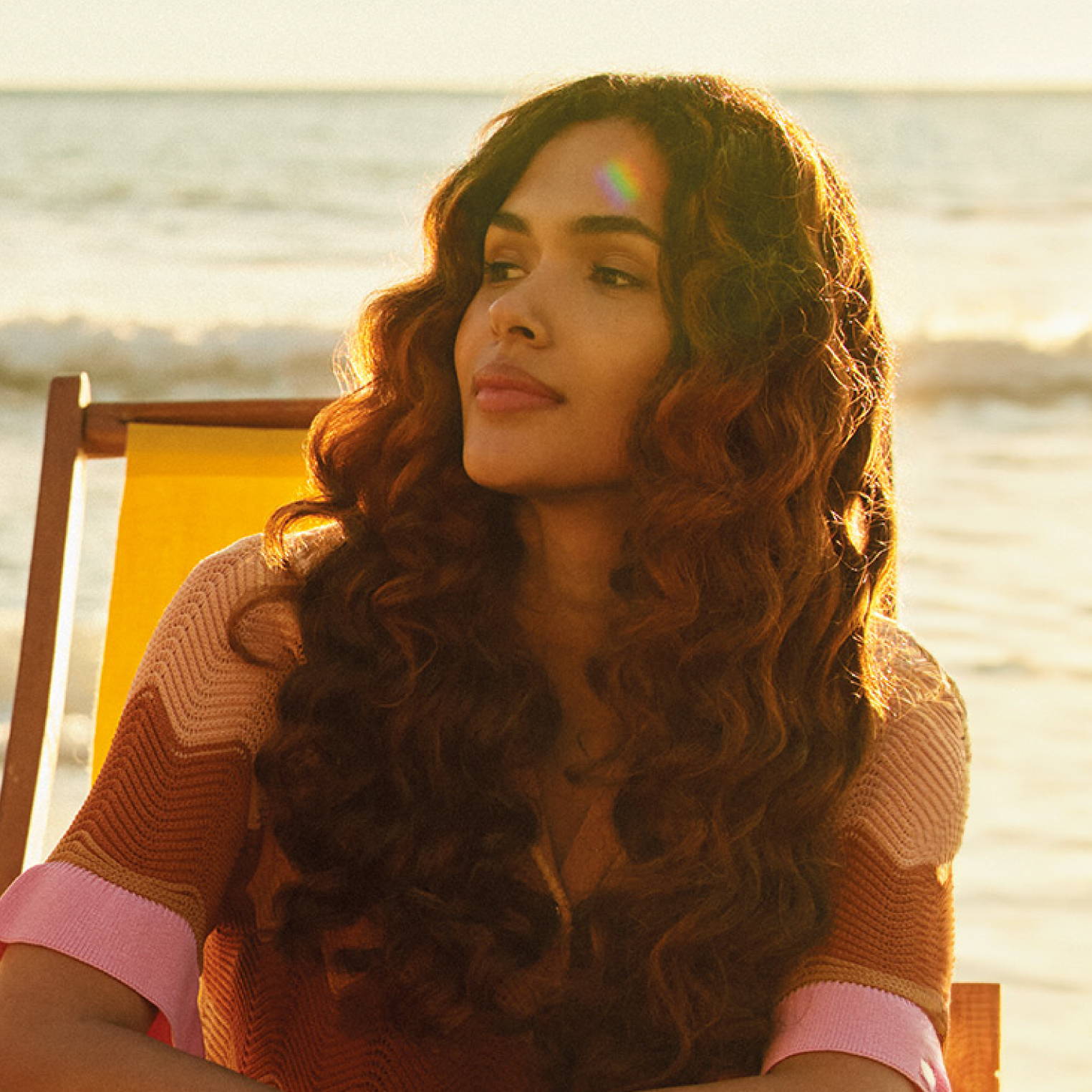 Davines model with wavy, curly hair