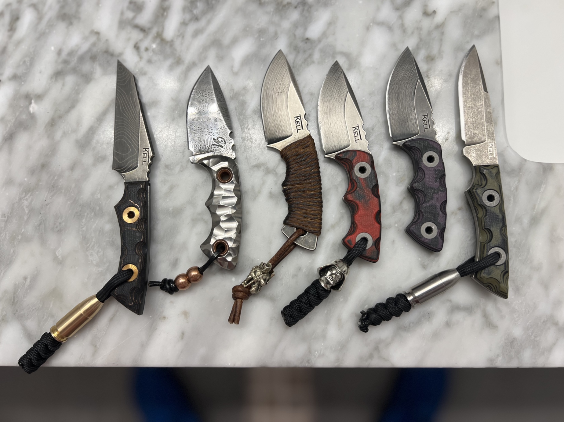 My piranha, WharEDC, and DP-1 knife collection. Waiting for my last lanyard bead to finish the givati DP-1. – by Joshua