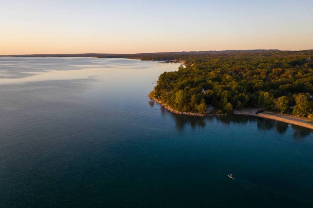 Inflatable SUP board in Lake Simcoe Canada