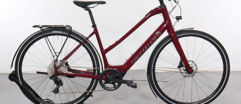 a red Specialized Turbo Vado SL 4.0 EQ electric city bike
