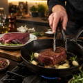 chef-pan-frying-emu-steaks