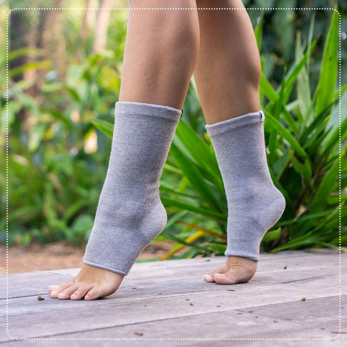 relieve foot pains, onecompress bamboo footsleeves, sad woman
