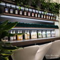 salon chairs lined up by mirrors with davines products and plants