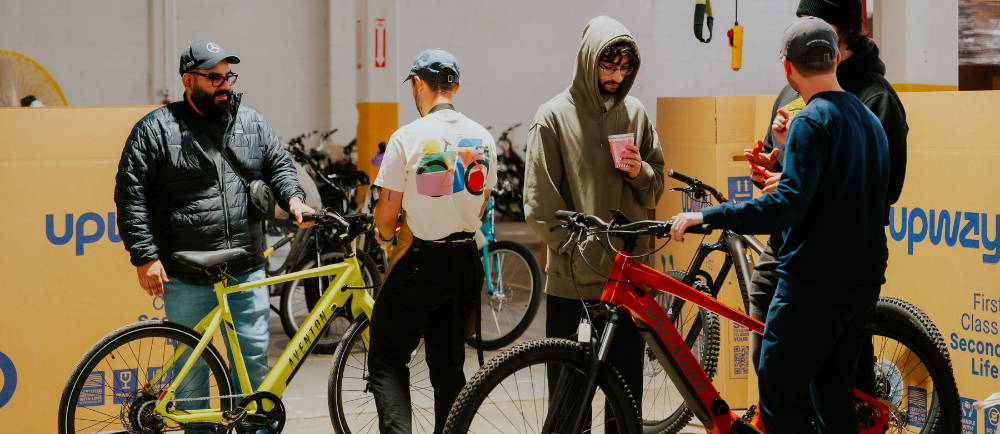 Upway UpCenter sales event with mechanics and customers and ebikes
