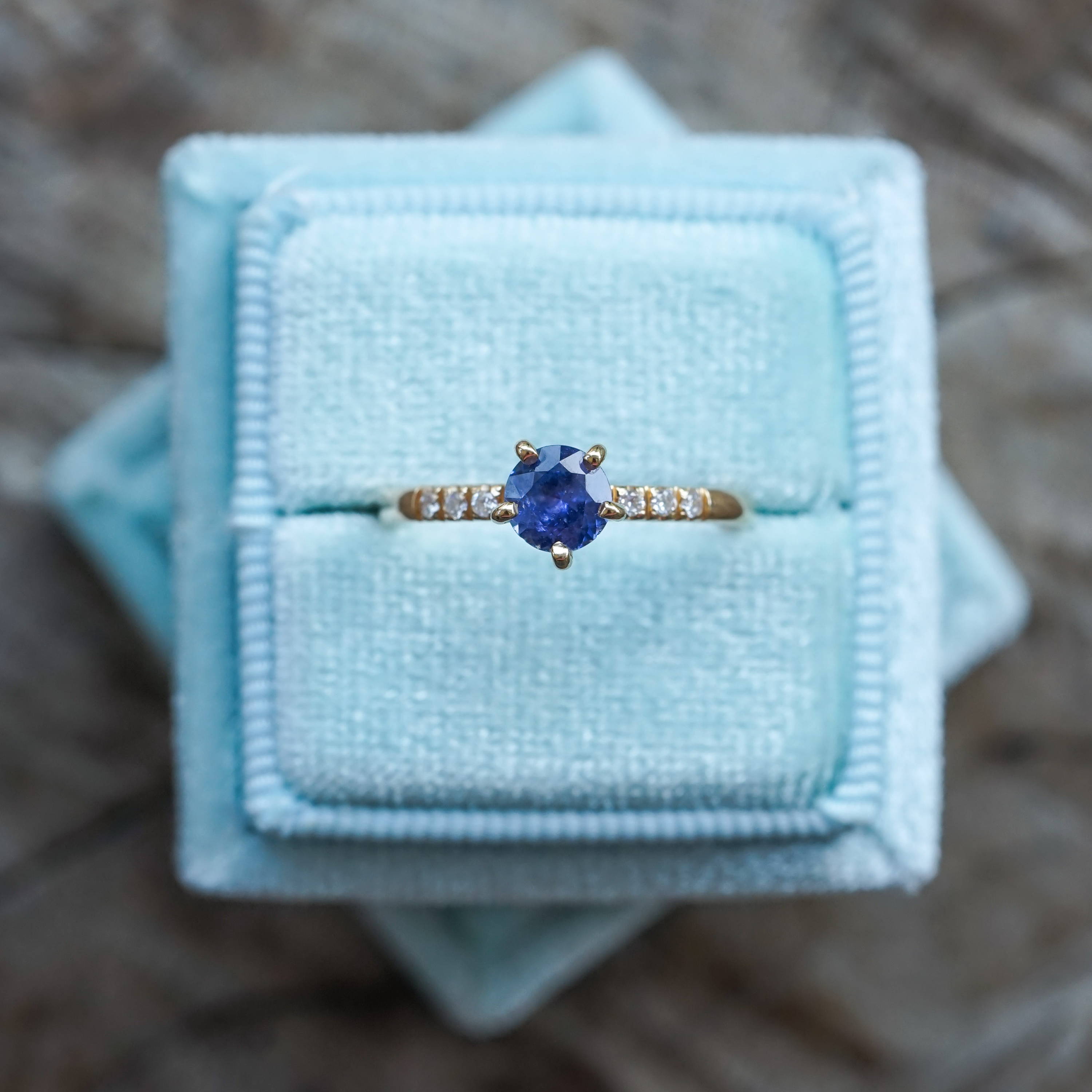 A stunning sapphire set in an ethical gold band accompanied by conflict free diamonds.