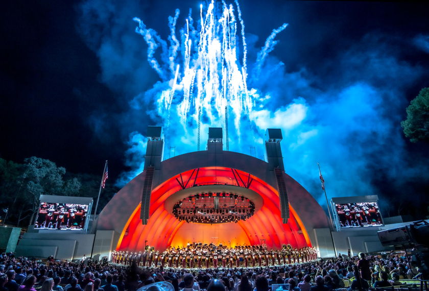 USC Trojan Marching Band on stage at the Bowl with fireworks