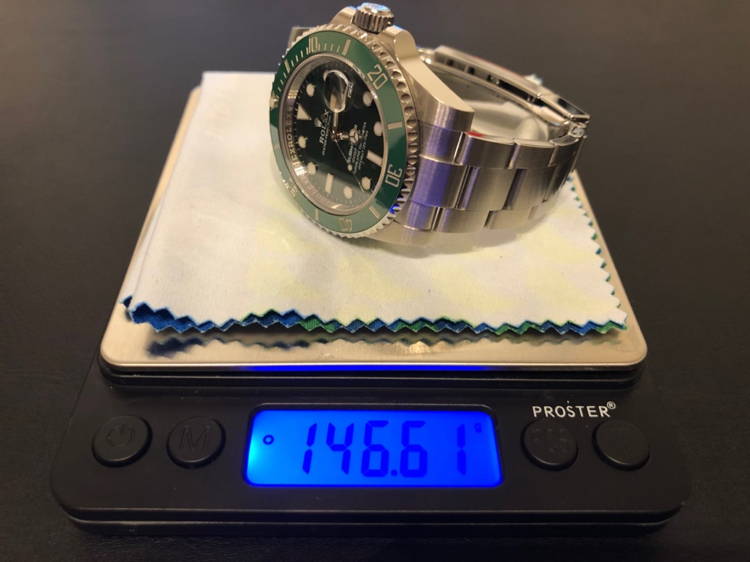 Rolex daytona weight online