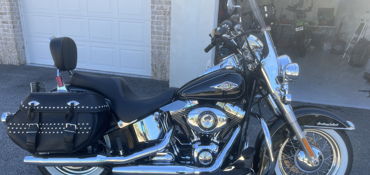 2014 HARLEY-DAVIDSON FLSTC HERITAGE SOFTAIL CLASSIC (VIVID BLACK) motorcycle for rent near Santa Rosa Beach, FL