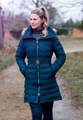Ladies Calsall coat with roll neck jumper in the countryside