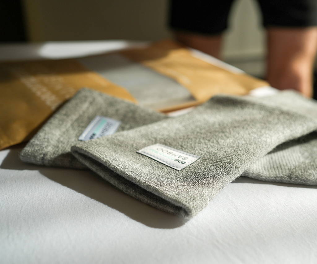 relieve foot pains, onecompress bamboo footsleeves, sad woman