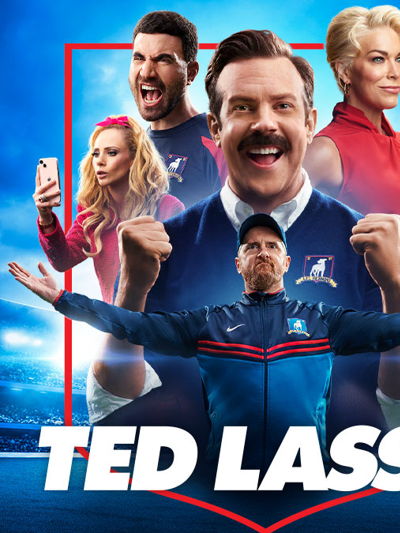 Promotional Image for the show Ted Lasso showing the main cast with Ted Lasso cheering in the center