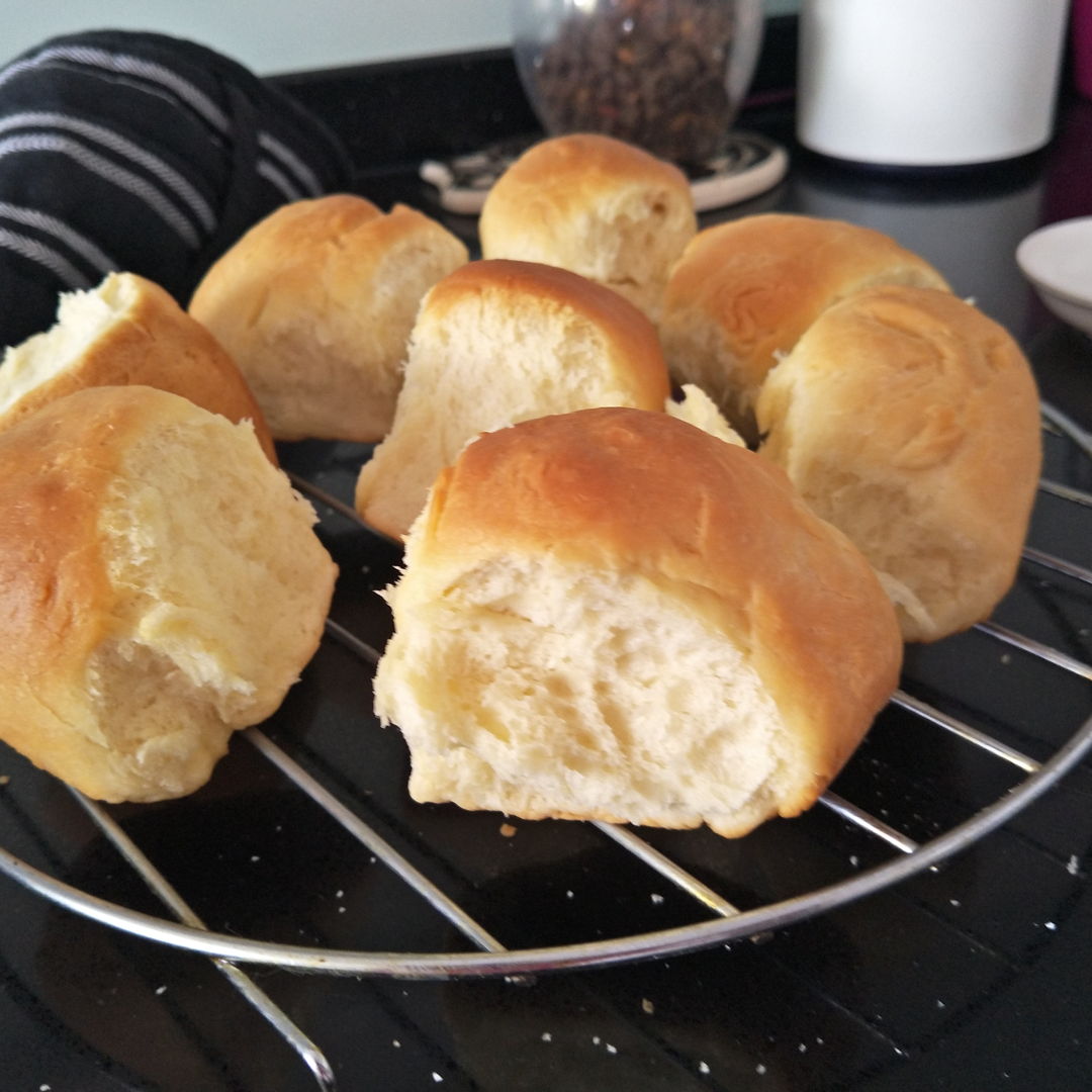 super light and fluffy homemade yeast rolls................straight from the oven and just eaten with butter!
