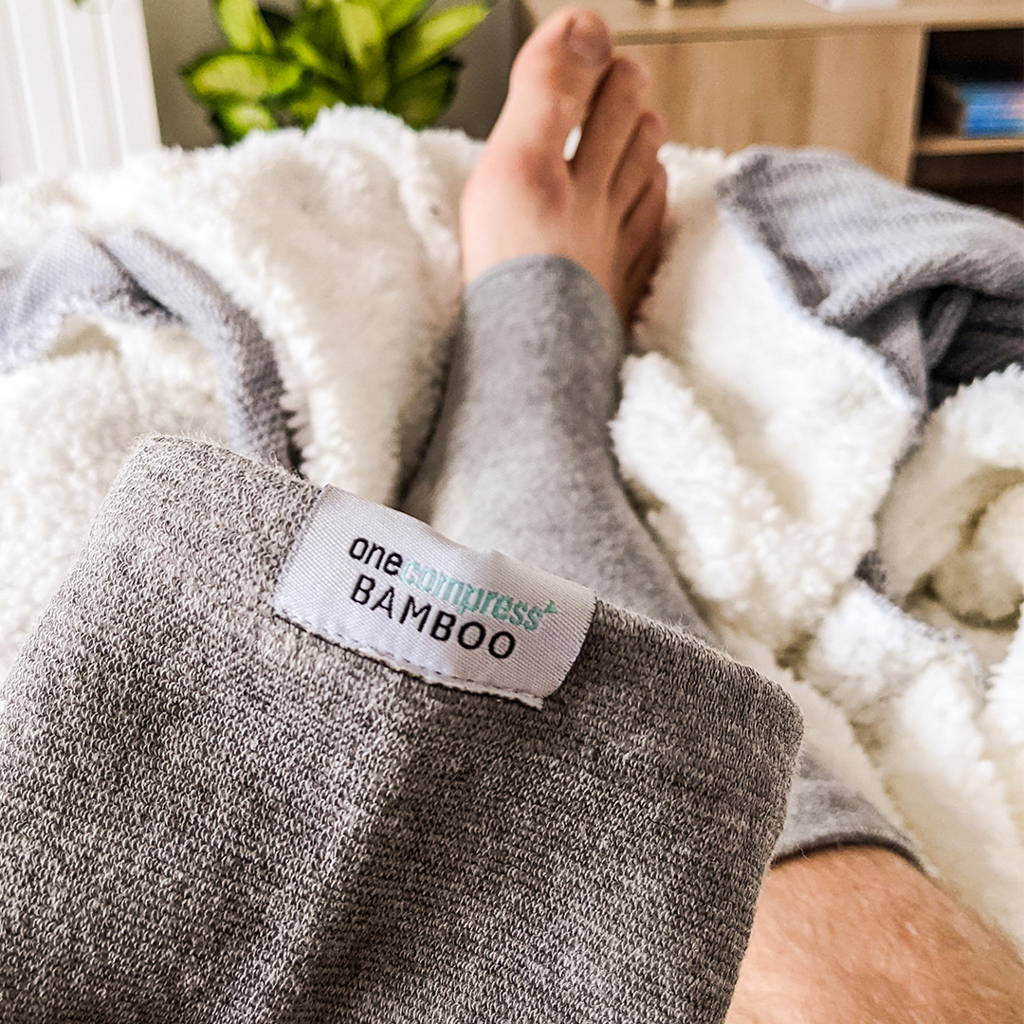 relieve foot pains, onecompress bamboo footsleeves, sad woman