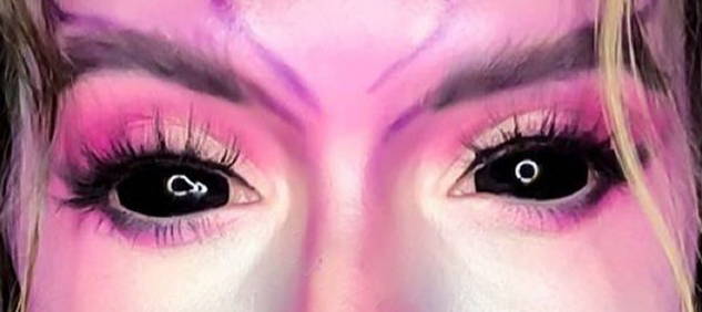 eyes with black sclera contacts on
