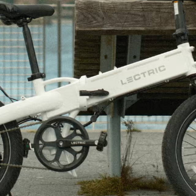 a white folding lectric electric bike