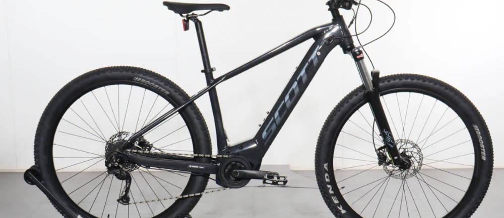 a black Scott Aspect eRide 940 front suspension electric mountain bike