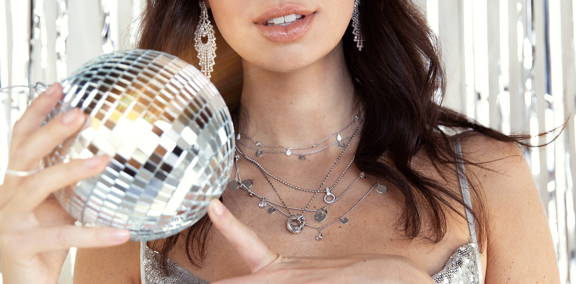 A model in silver ettika jewelry