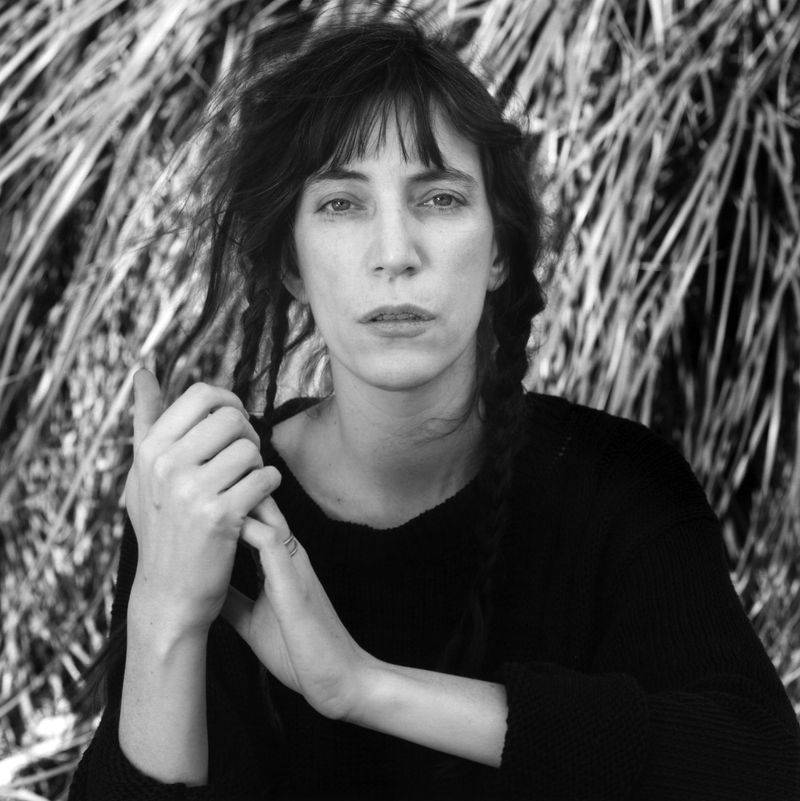 Image may contain: Patti Smith, Body Part, Finger, Hand, Person, Face, Head, Photography, Portrait, and Adult