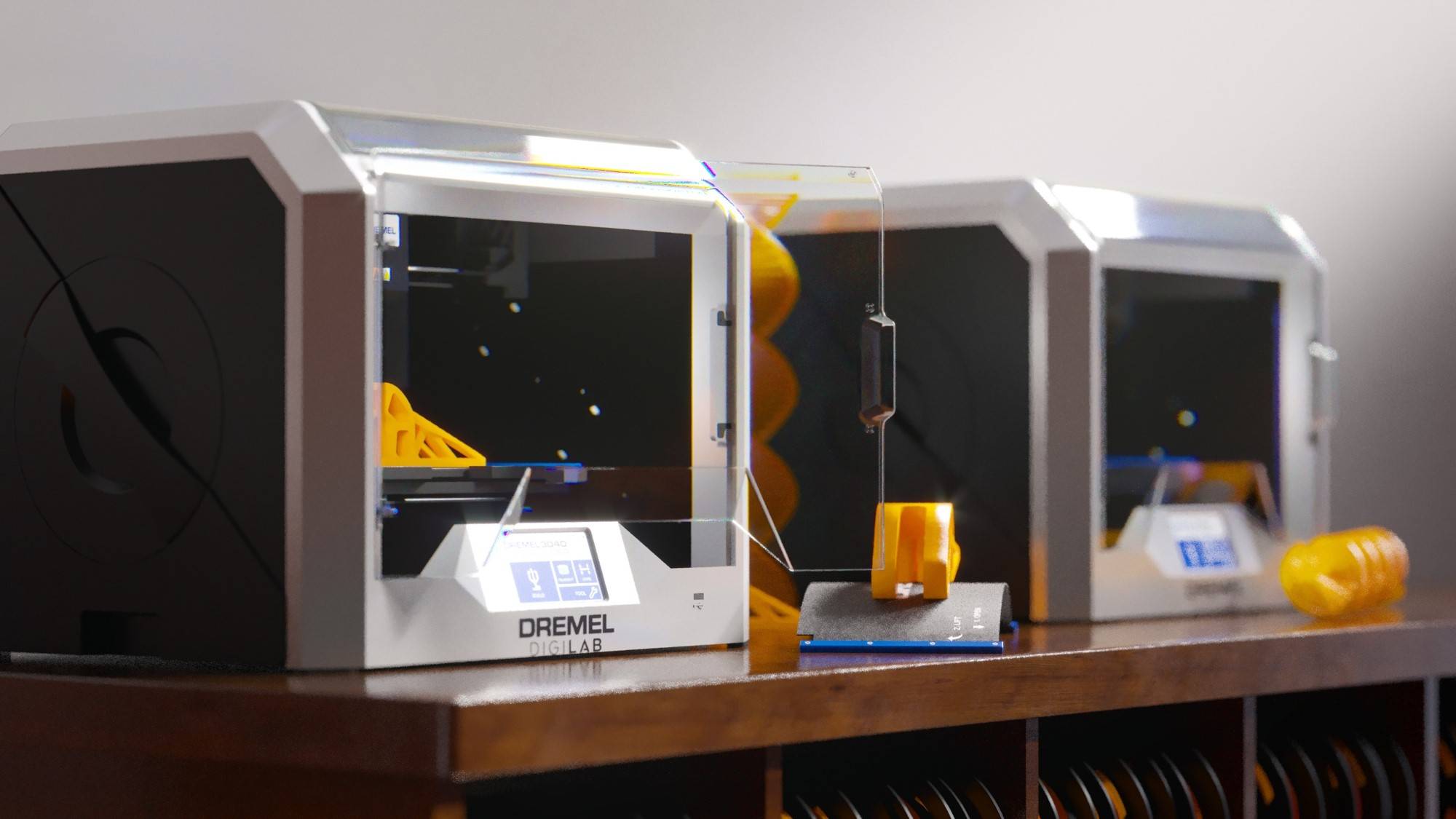 Three quarter angle of two 3D40-FLX 3D printers sitting on a wooden shelf