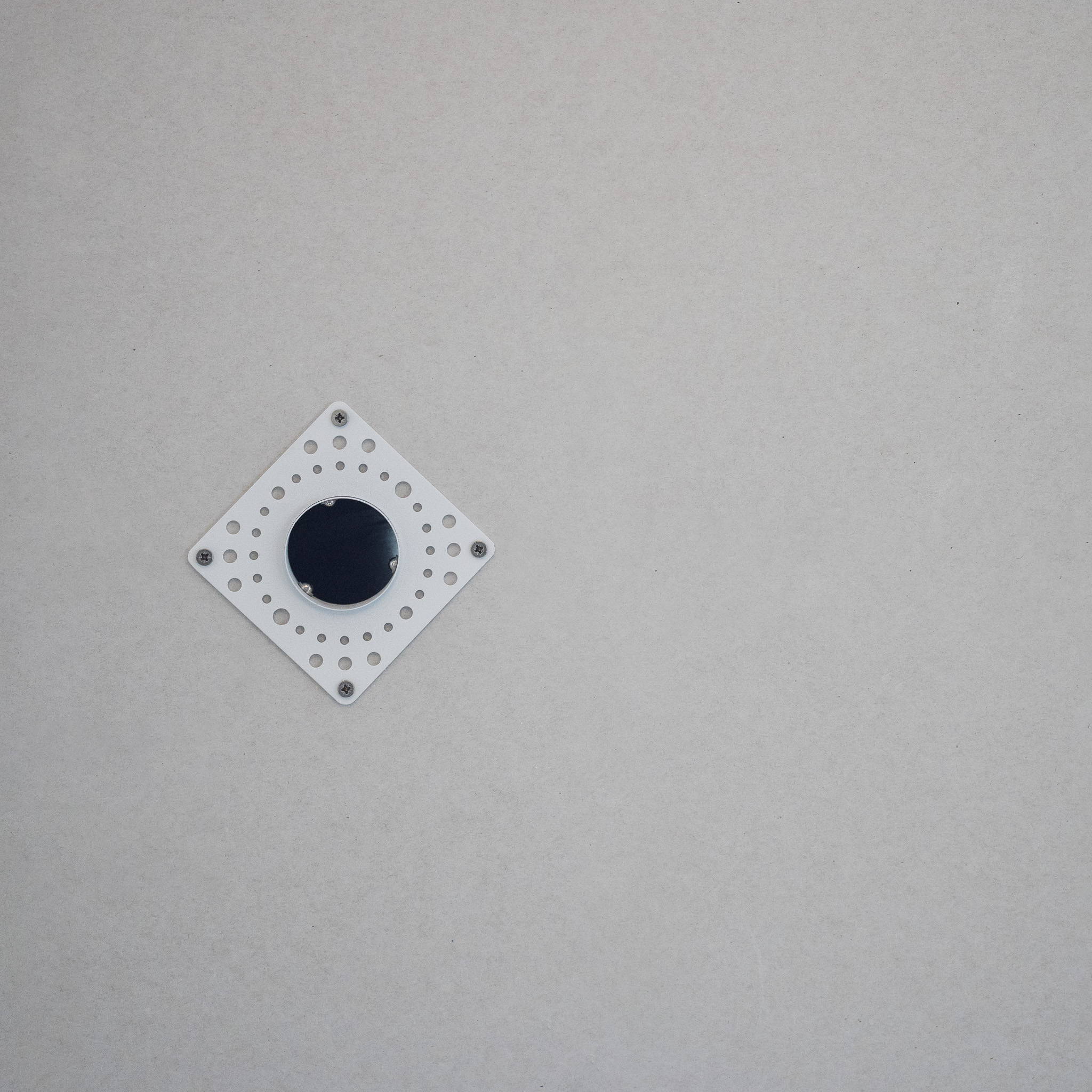 Faradite matt white TAP-1 mounted on a kitchen wall used with Loxone