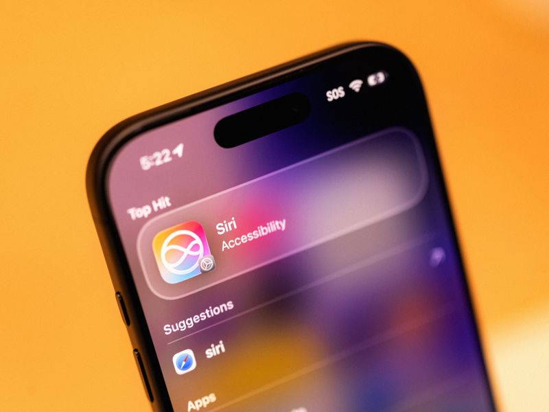 The Apple Siri icon on an iPhone at an Apple store in San Francisco, California, US, on Wednesday, Feb. 11, 2026. Apple Inc.'s long-planned upgrade to the Siri virtual assistant has run into snags during testing in recent weeks, potentially pushing back t