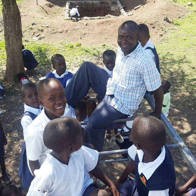 group of boys and teacher hope school mbita