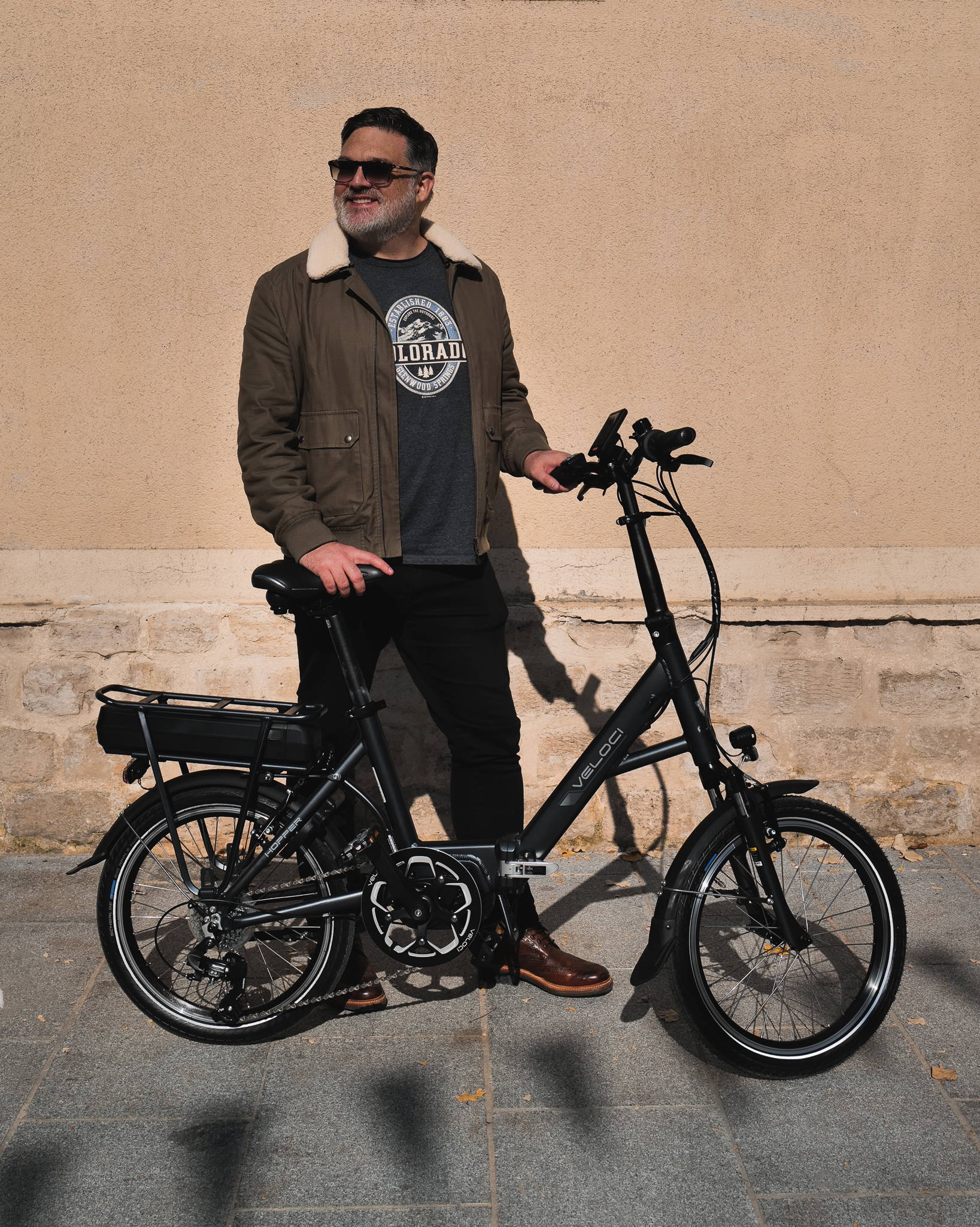 Man Looking at  Electric bike