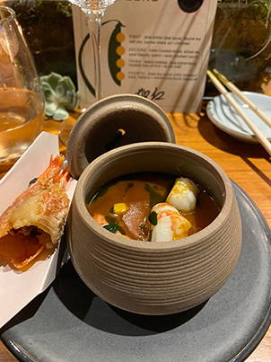 A bowl of savory corn chawanmushi with shrimp.