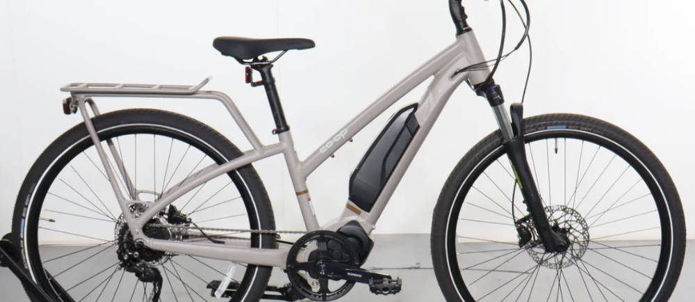 a light grey Co-Op Generation e1.2 electric city bike